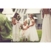 Beautiful flower girls with flower crowns and mini bouquets